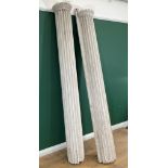 A pair of white painted half round fluted Columns with egg & dart decorations to the upper socles,