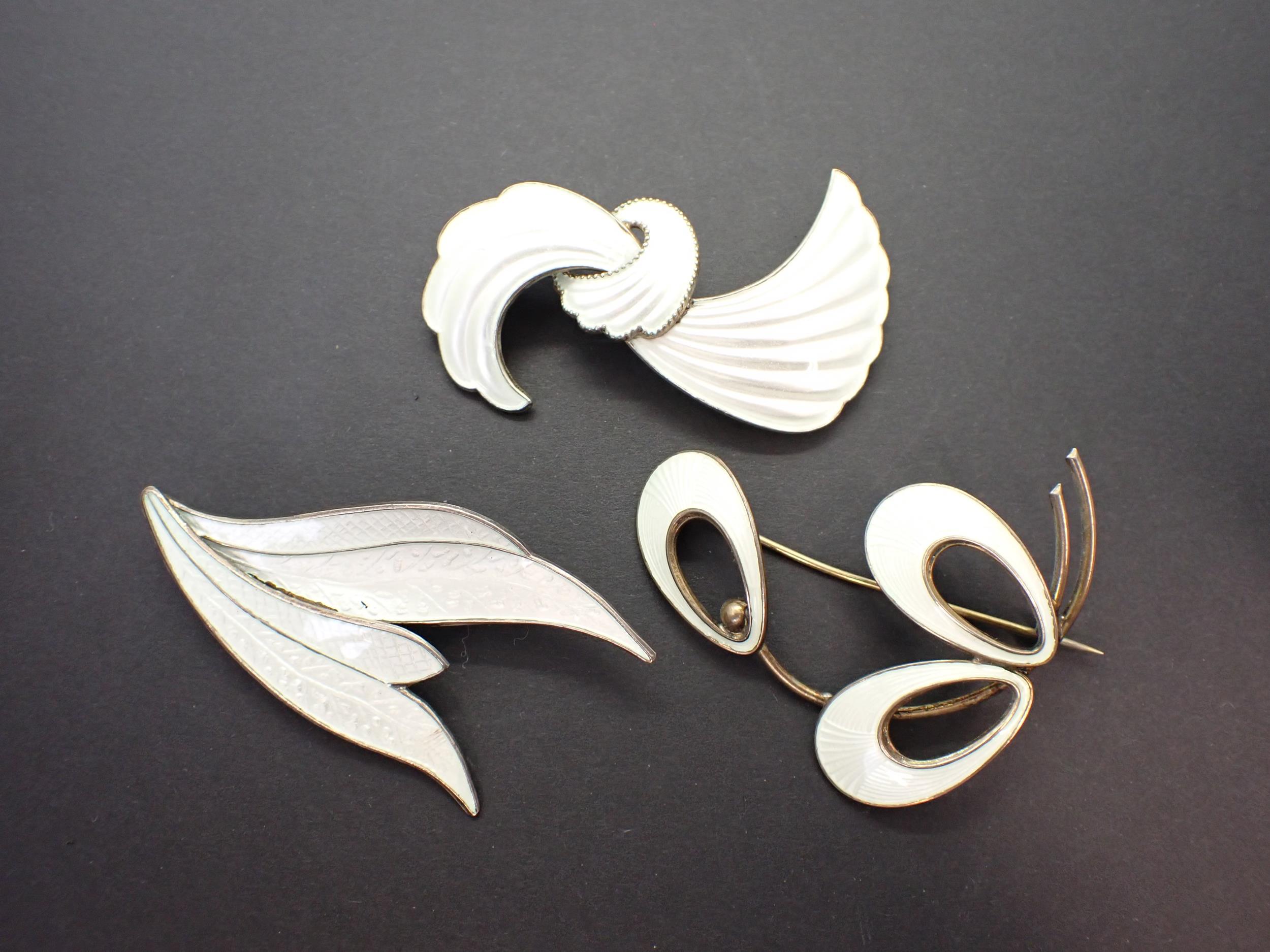 Three Modernist Norwegian sterling silver and white enamel Brooches