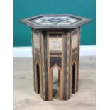 A Moorish hardwood hexagonal Occasional Table, the top with star and central script motif, with