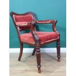 A George IV mahogany framed Library Elbow Chair with upholstered back, arms and seat on turned and