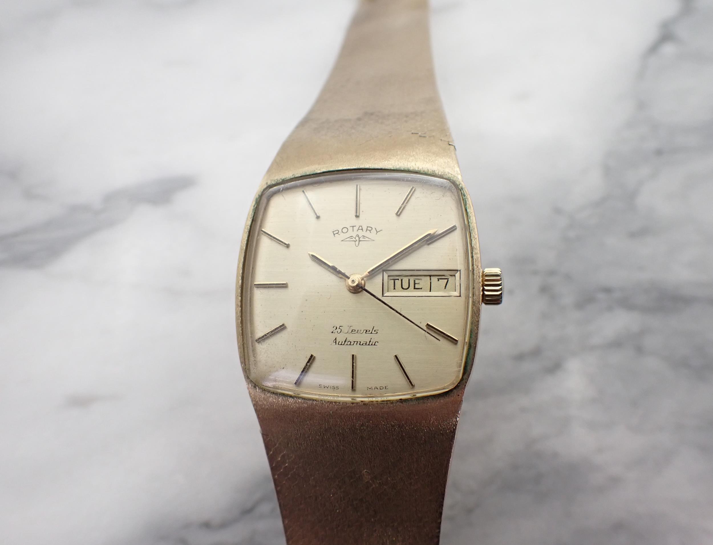 A gentleman's Rotary Automatic Wristwatch the square dial with hourly baton markers, sweep seconds