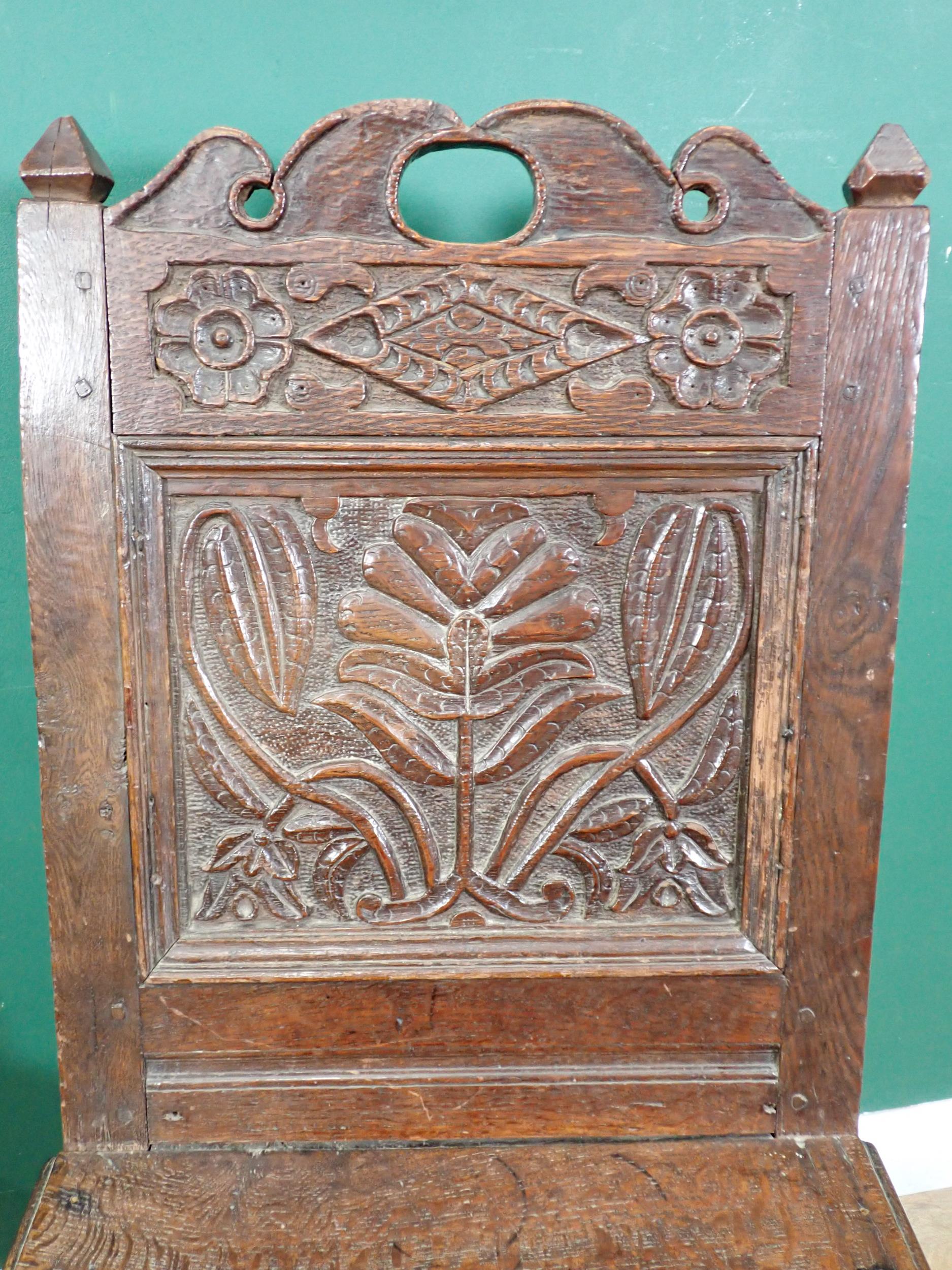 A pair of 17th Century oak Hall Chairs with pierced shaped crests above foliate carved panel - Image 4 of 6