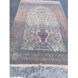 A large bordered Persian Prayer Rug, the central field with vase of flowers, the main border with