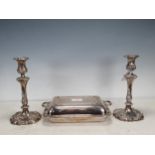 A pair of plated Pillar Candlesticks with leafage columns, shaped circular scroll bases, 10in, and a