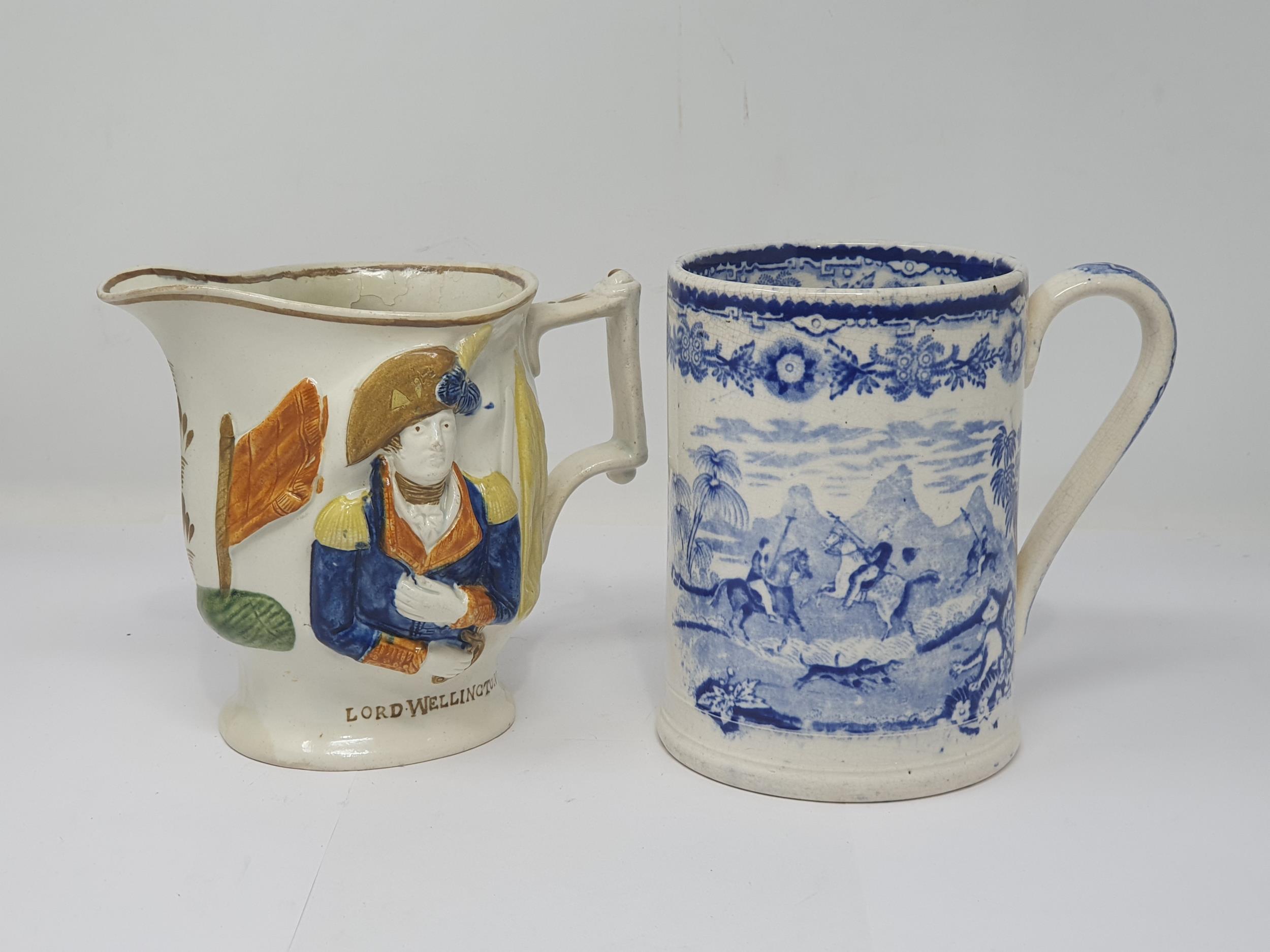 A 19th Century English pottery Jug with relief moulded portraits of Lord Wellington and General Hill