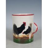 A Wemyss Ware large Mug, decorated chickens, with puce rim and handle, 5¾in H, A/F, impressed mark