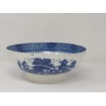 A late 18th or early 19th Century English Bowl with blue and white transfer design of Chinese