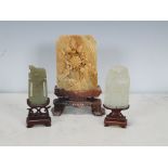Two rectangular carved and pierced Jade Pieces on hardwood stands, approx 1 1/2in x 3in and 1 3/