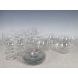 A set of eleven Baccarat Wine Glasses in the Paris goblet style with panel cut stems and acid etched