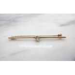 A Diamond Bar Brooch claw-set single old-cut stone, unmarked, approx 55mm long, approx 2.30gms
