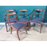 A set of four Regency mahogany Dining Chairs with rope twist back, the carvers with scroll arms