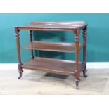 A 19th Century mahogany small three tier Buffet with moulded shelves on turned tapering supports and
