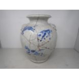 A Cantonese enamel Vase, decorated figures in rectangular reserves, floral surround, 8in, some