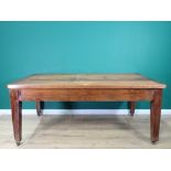 An antique mahogany Club Table with cleated top, fitted end drawer mounted upon square cut
