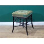 A 19th Century ebonised upholstered Stool with turned and open frieze, raised on simulated bamboo