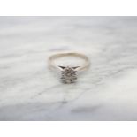 A Diamond single stone Ring illusion-set brilliant-cut stone in 18ct white gold, ring size L 1/2,