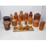 A Collection of treen Bottle Holders, Jars, etc, and a brass Cribbage Board