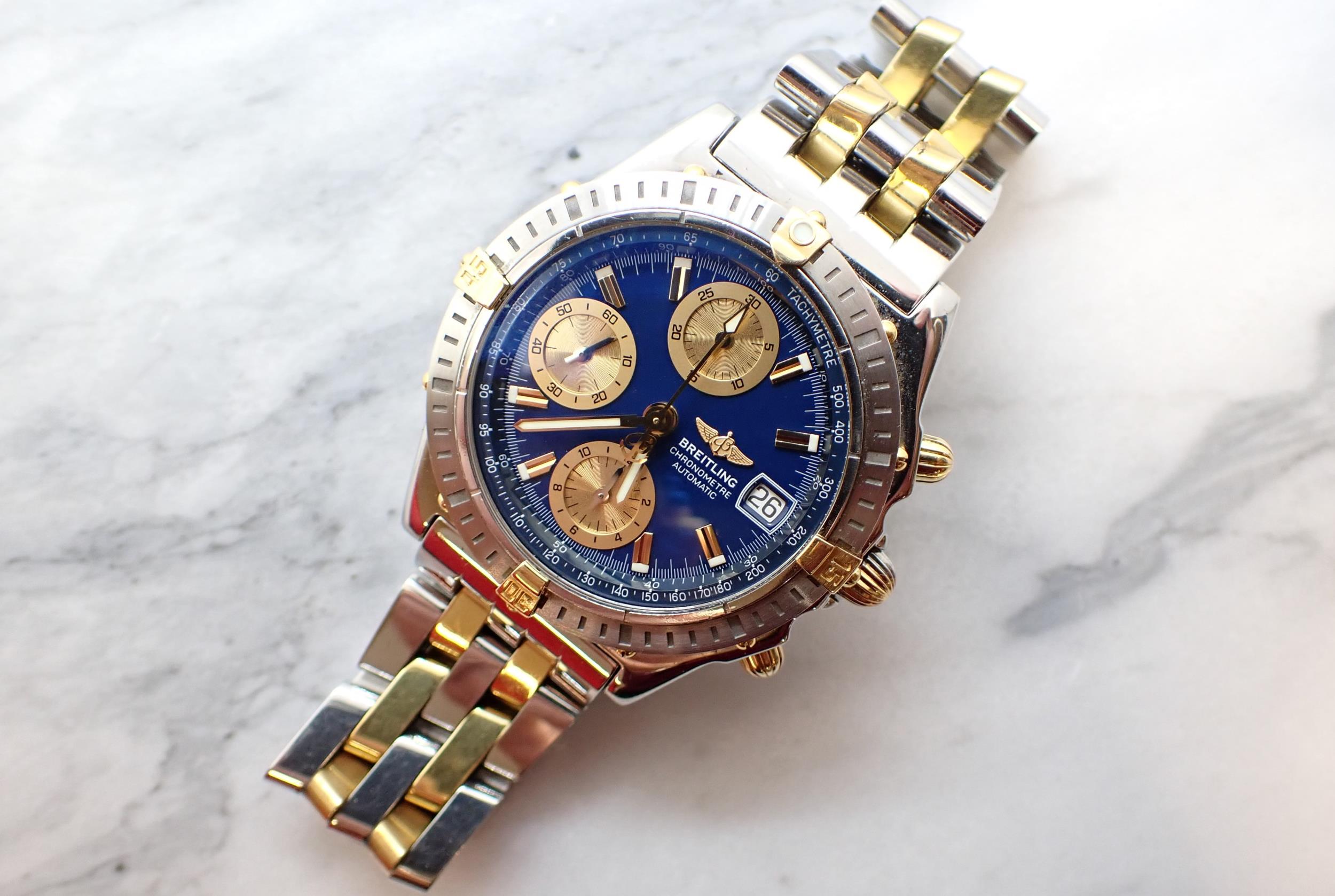 A 2002 Breitling Chronometre Automatic Wristwatch the dark blue dial with gold coloured hourly baton