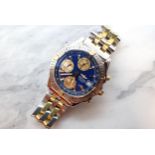 A 2002 Breitling Chronometre Automatic Wristwatch the dark blue dial with gold coloured hourly baton