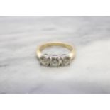 A Diamond three stone Ring claw-set brilliant-cut stones, total diamond weight 1.23cts, in 18ct