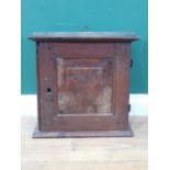 An 18th Century burr elm and oak Spice Cupboard, the single door having raised burr elm panel