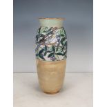 A Royal Doulton Vase with tube-lined decoration of birds amongst flowering branches, 13¼in H,