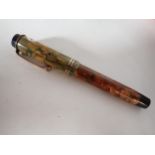 A Parker Duofold Senior Fountain Pen in green/brown marbled effect case