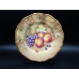 A Royal Worcester Plate painted peaches and grapes, signed Freeman, gilt gadroon border, 10½in