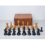 A Jacques boxwood and ebony Chess Set stamped 'Jacques, London' in mahogany two division Box