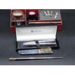 A silver handled Knib Pen, Kingsley Ballpoint, a Propelling Pencil, Crystal Inkwell Set, and a Pen