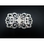 An Edward VII silver Nurse's two part Buckle with pierced scroll design, Chester 1908, maker: J &