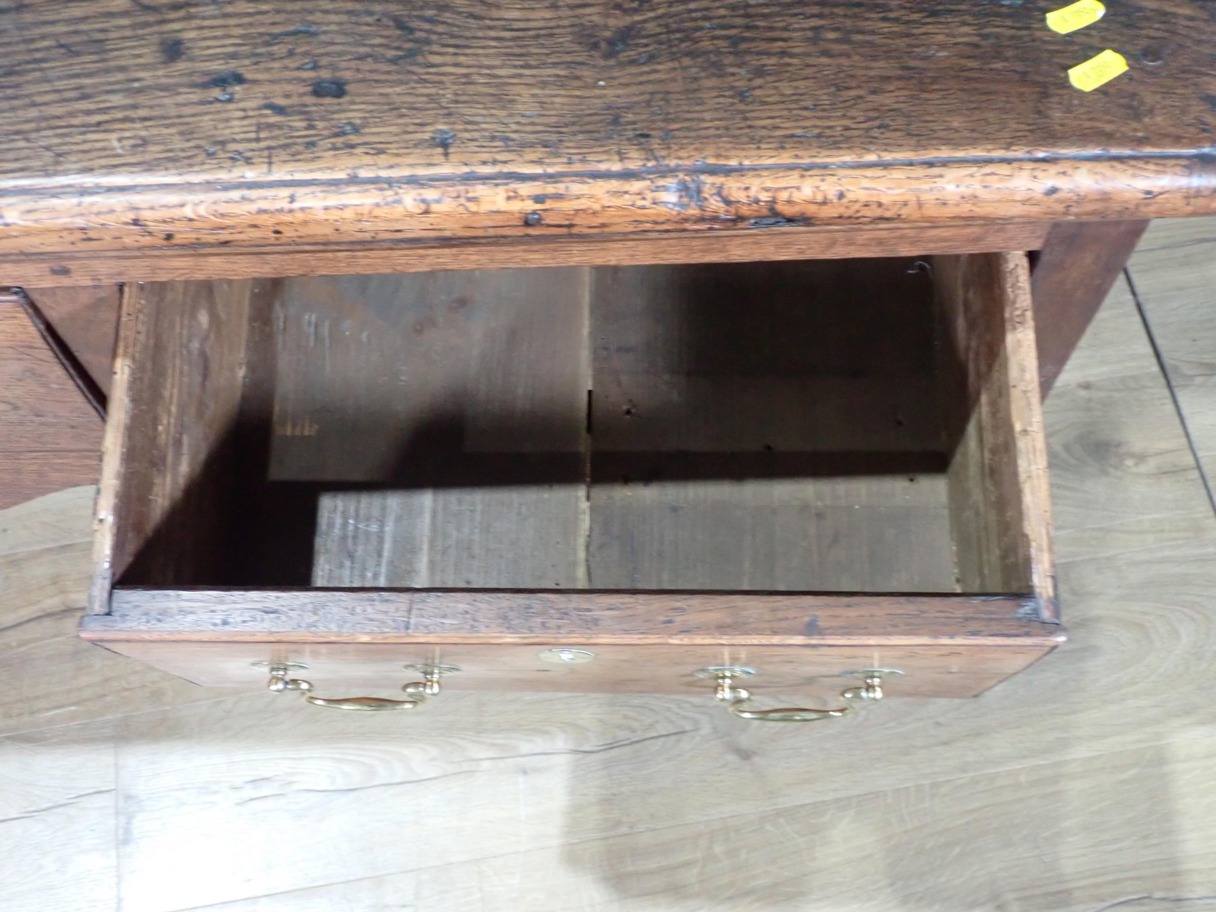 An 18th Century oak Dresser Base with thick moulded top fitted three frieze drawers above shaped - Image 10 of 12