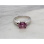 A Pink Sapphire Ring claw-set cushion-cut stone, 1.33cts, in 18ct white gold, ring size K 1/2
