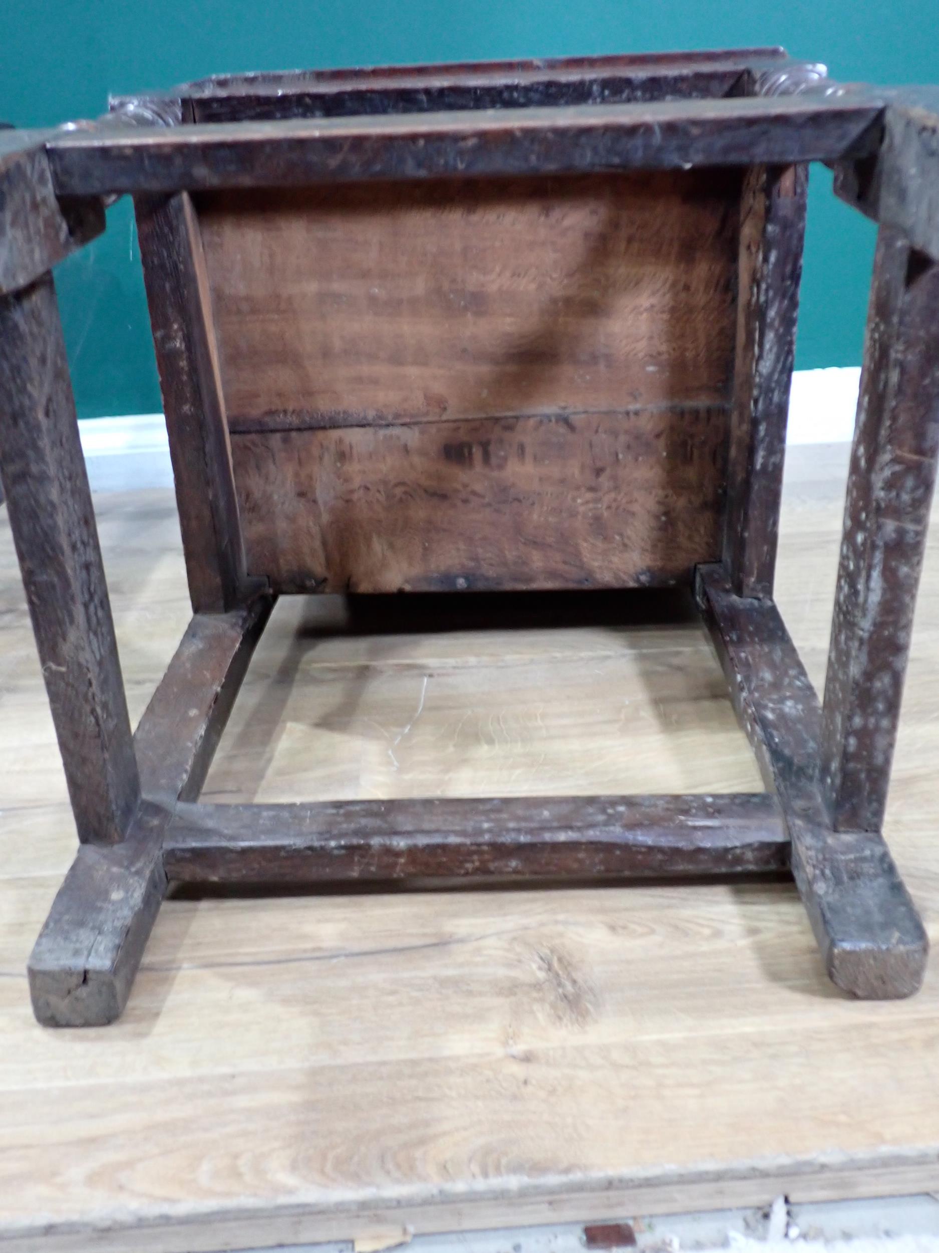 A pair of 17th Century oak Hall Chairs with pierced shaped crests above foliate carved panel - Image 6 of 6