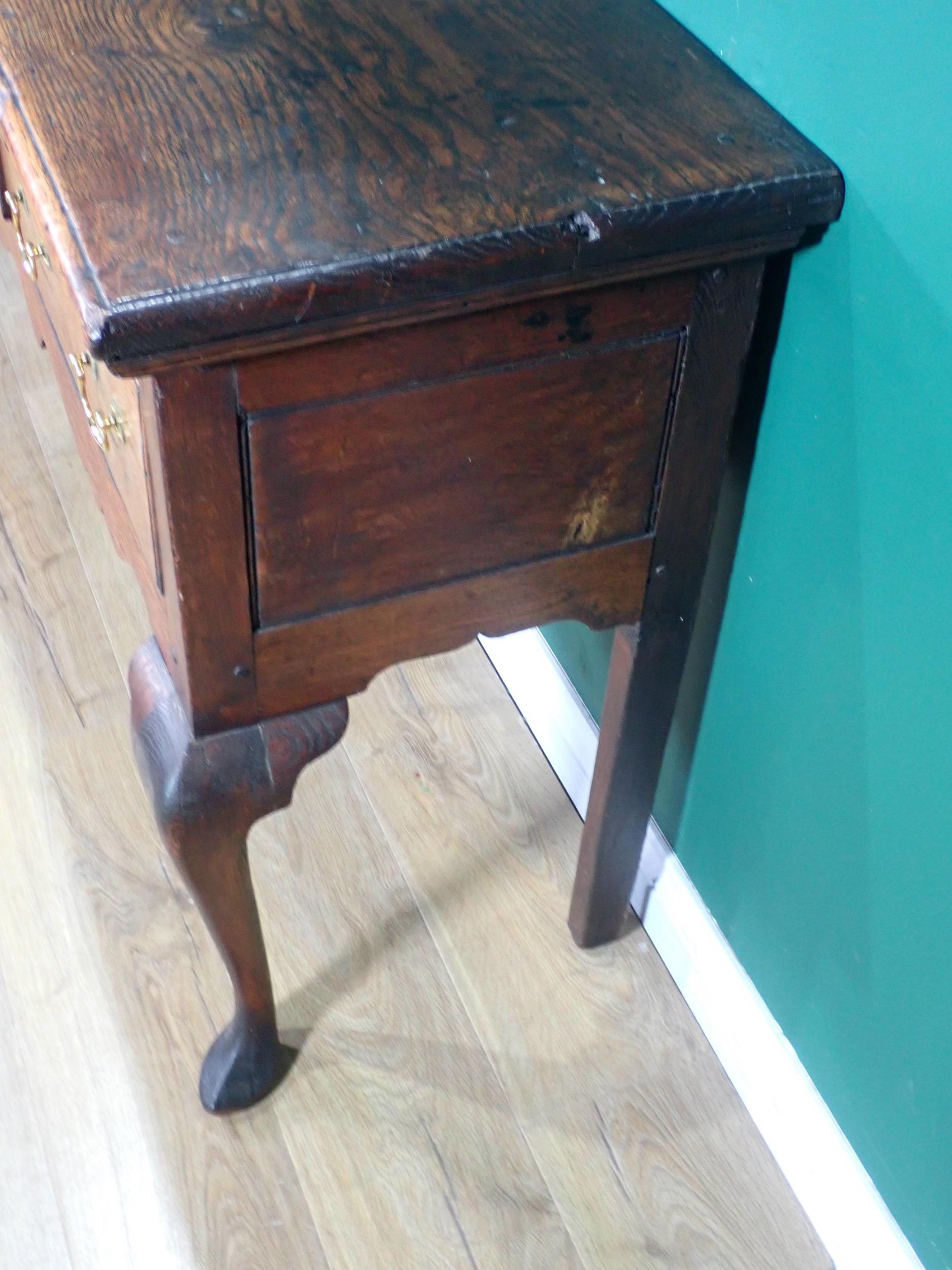 An 18th Century oak Dresser Base with thick moulded top fitted three frieze drawers above shaped - Image 7 of 12