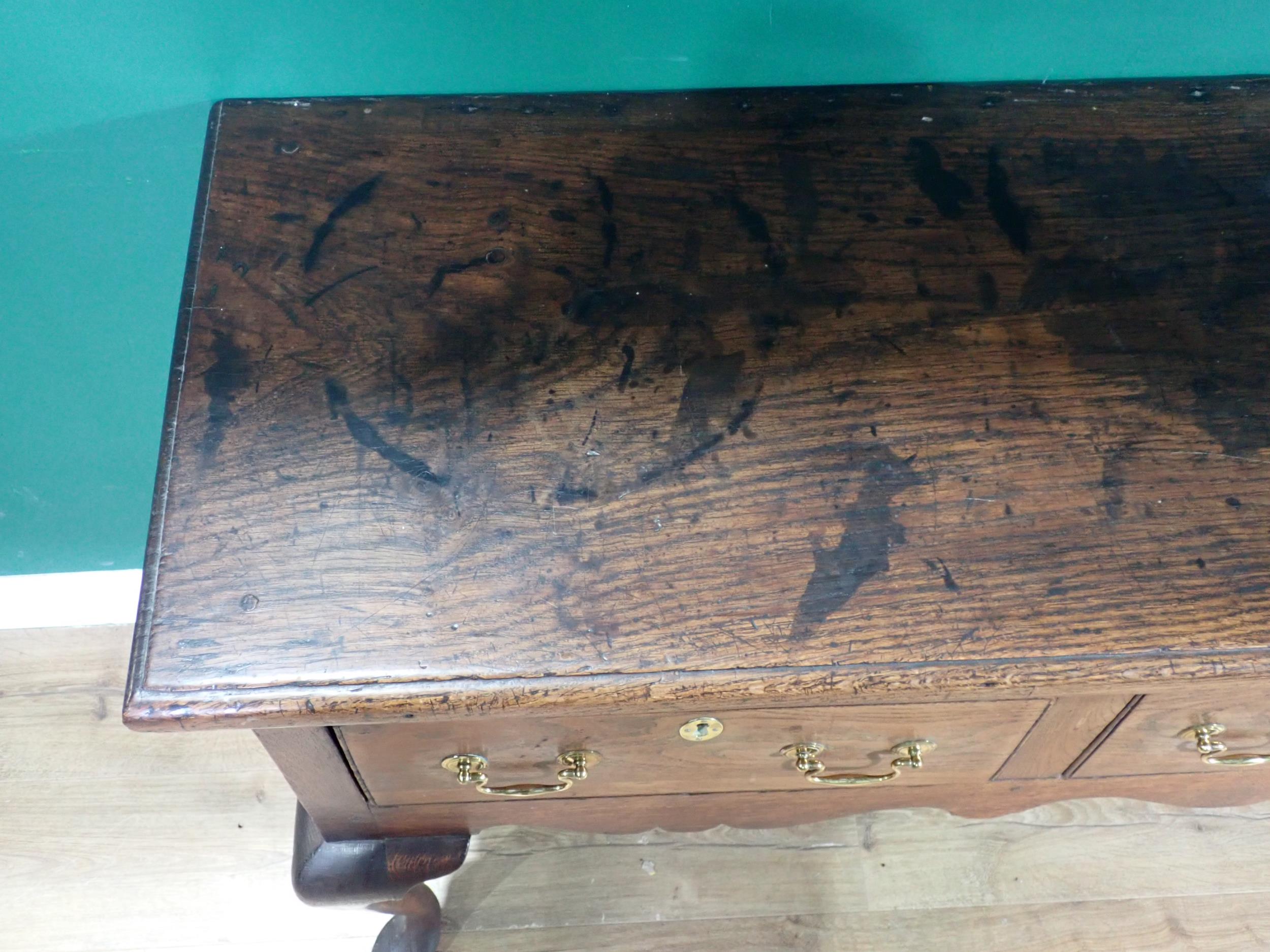 An 18th Century oak Dresser Base with thick moulded top fitted three frieze drawers above shaped - Image 3 of 12