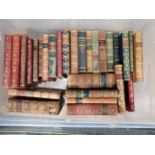 Box of leather bound volumes, Vicar of Wakefield, Robinson Crusoe, etc; (box)