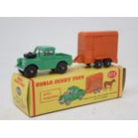 Dublo Dinky Toys 073 Land Rover and Trailer, boxed with horse and black wheels. Mint condition,