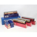Mixed collection of nine boxed Hornby Dublo items to include rare 4005 1/2nd Coach, unused and in