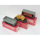 Three Hornby Dublo Wagons including 4644 Hopper Wagon, 4646 Low-sided Wagons with aluminium cable
