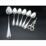 Five Danish silver Table Spoons, marked D. ANDERSEN 1900, 307gms, a plated Basting Spoon and a