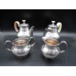An Elizabeth II silver three piece Tea Service of bulbous form, London 1961, and a matching Coffee