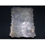 An Edward VII silver Card Case with butterfly and floral engraving, two cartouches, Birmingham 1904,