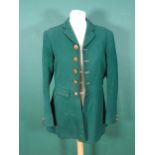 A Heythrop Hunt green Coat with brass H.H. buttons