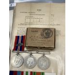 Four; WWII trio including Defence Medal, War Medal, 1939-45 Star and Italy Star in box of issue with