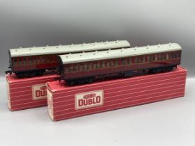 Hornby Dublo pair of 4083 and 4084 B.R. Suburban Coaches in Nr mint-mint condition, boxes Nr perfect