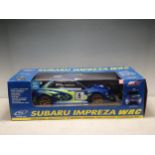 A boxed Radio Controlled Subaru WRC Car