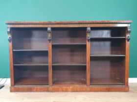 An aesthetic walnut open Bookcase with incised and gilded frieze above three sections of