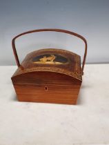 A domed Sewing Box with carrying handle, the hinged cover depicting a mother and child in an oval