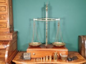 A large set of Avery brass and mahogany gold Balance Scales, the base fitted drawer and with a